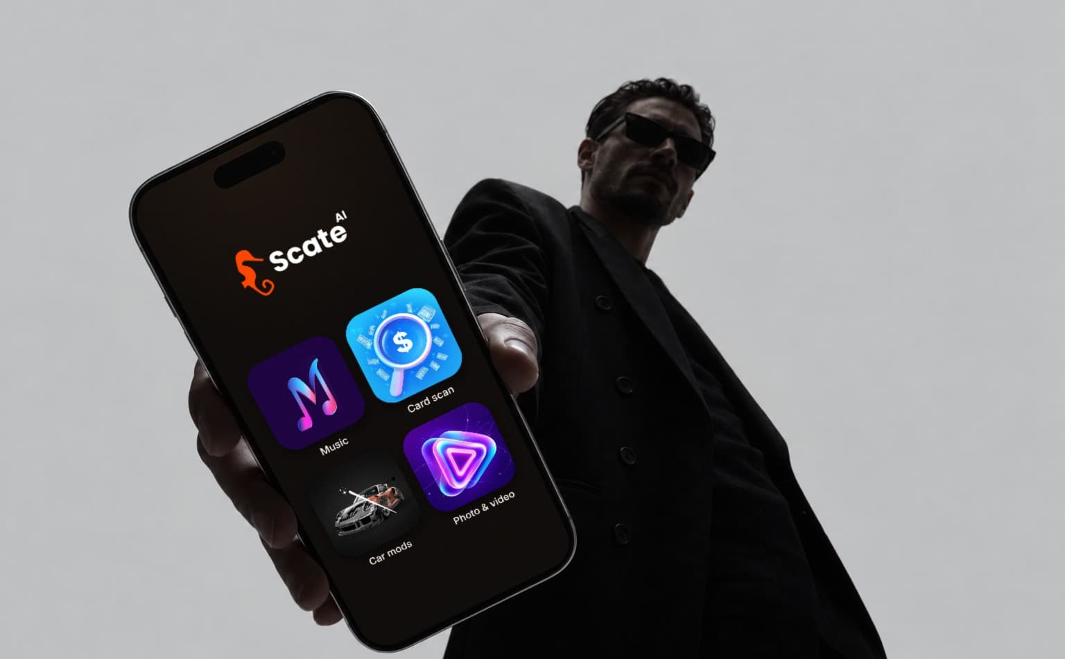 A phone showing Scate’s music, card scan, car mods and photo apps